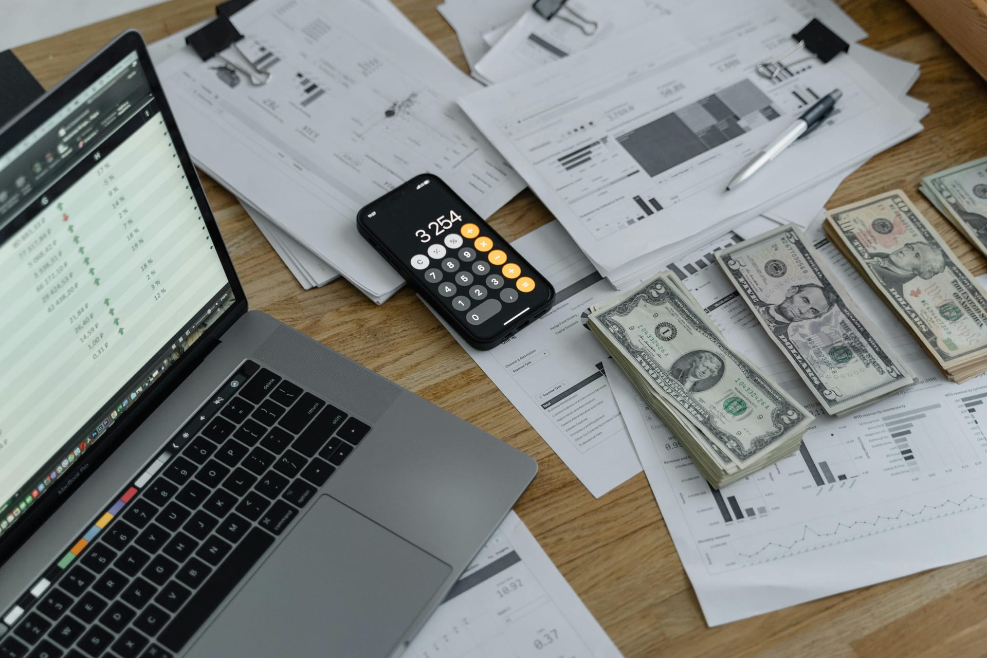 AJR advisor reviewing financial documents with a client during a consultation